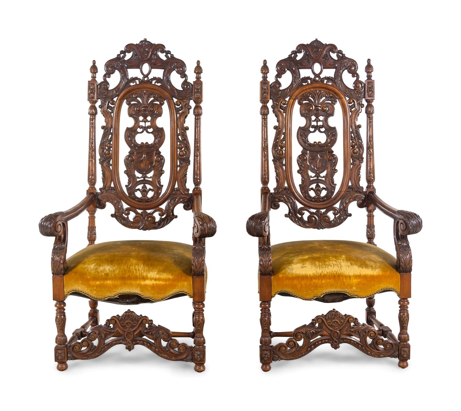 A Pair of Charles II Style Carved Armchairs