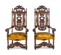 A Pair of Charles II Style Carved Armchairs