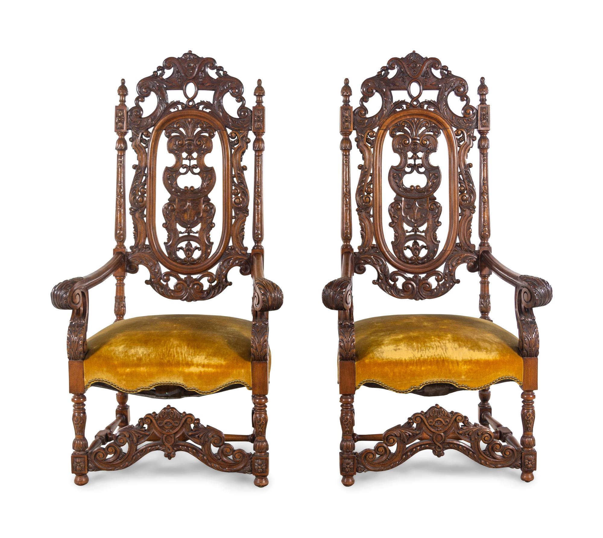 A Pair of Charles II Style Carved Armchairs