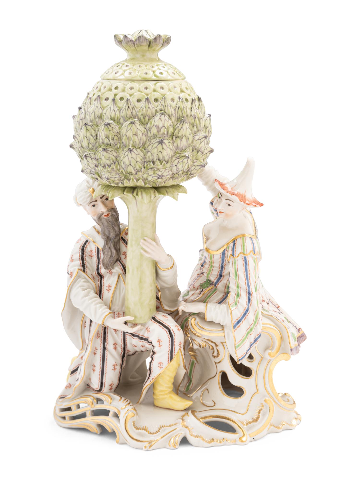 A Nymphenburg Porcelain Group of Figures with an Artichoke as a Perfume Burner
