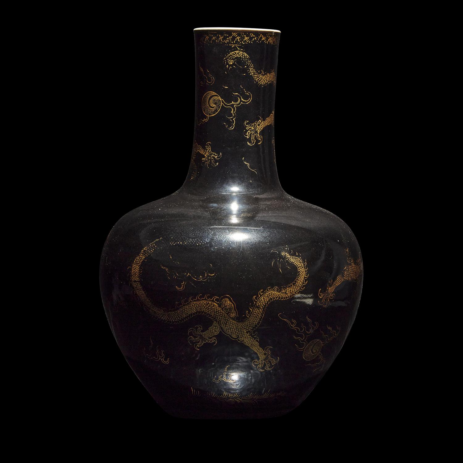 A Large Chinese Gilt-Decorated Black Glazed 'Dragon' Vase, Tianqiuping 黑地描金龍紋天球瓶