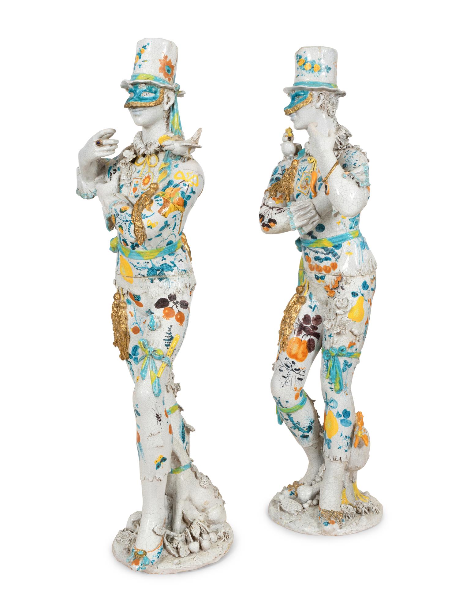 A Pair of Monumental Italian Gilt and Polychrome-Glazed Terracotta Figures of Masked Performers