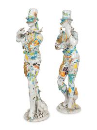 A Pair of Monumental Italian Gilt and Polychrome-Glazed Terracotta Figures of Masked Performers