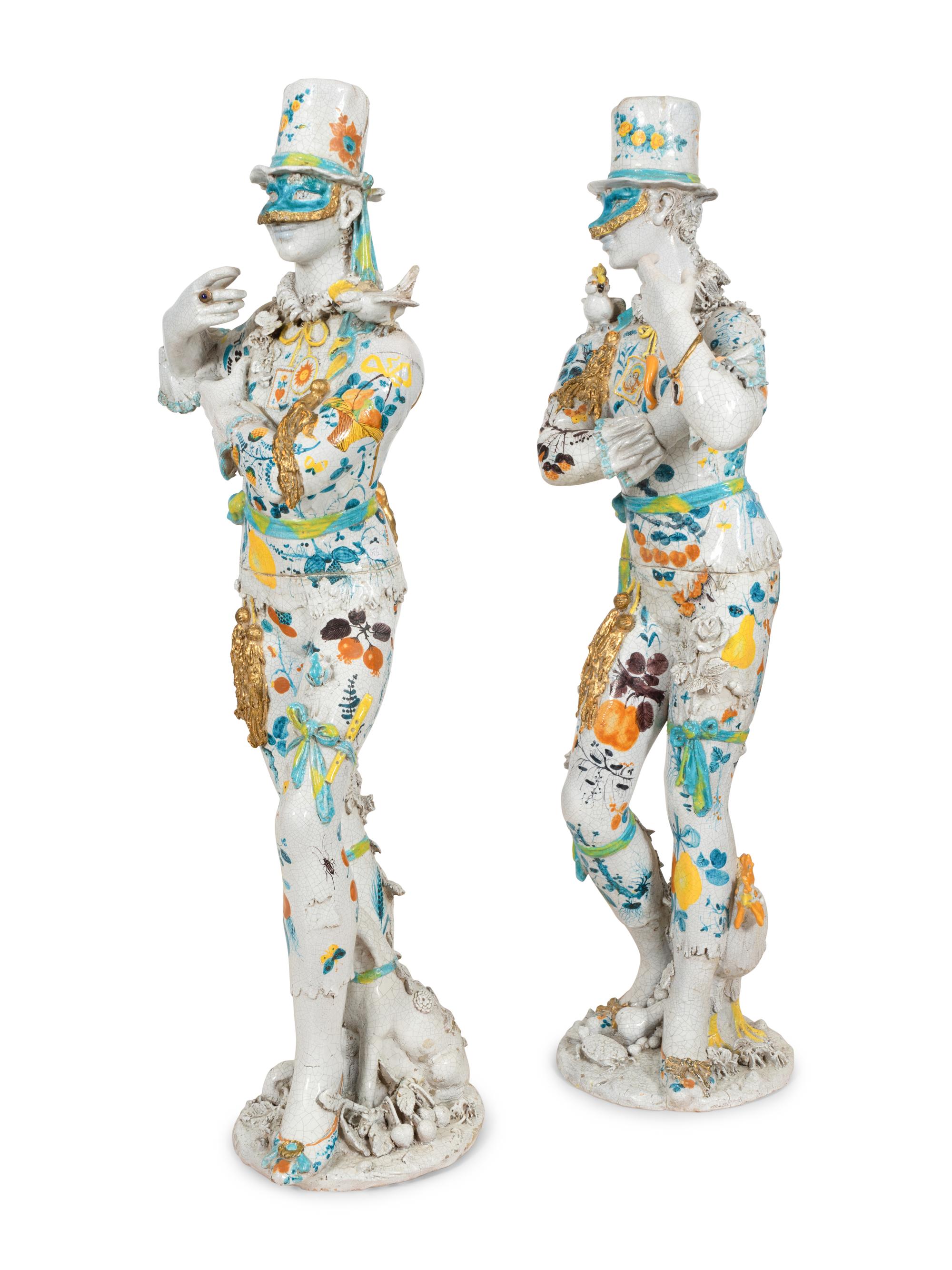 A Pair of Monumental Italian Gilt and Polychrome-Glazed Terracotta Figures of Masked Performers