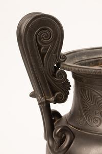 A Pair of Grand Tour Patinated Metal Urns on Marble Bases