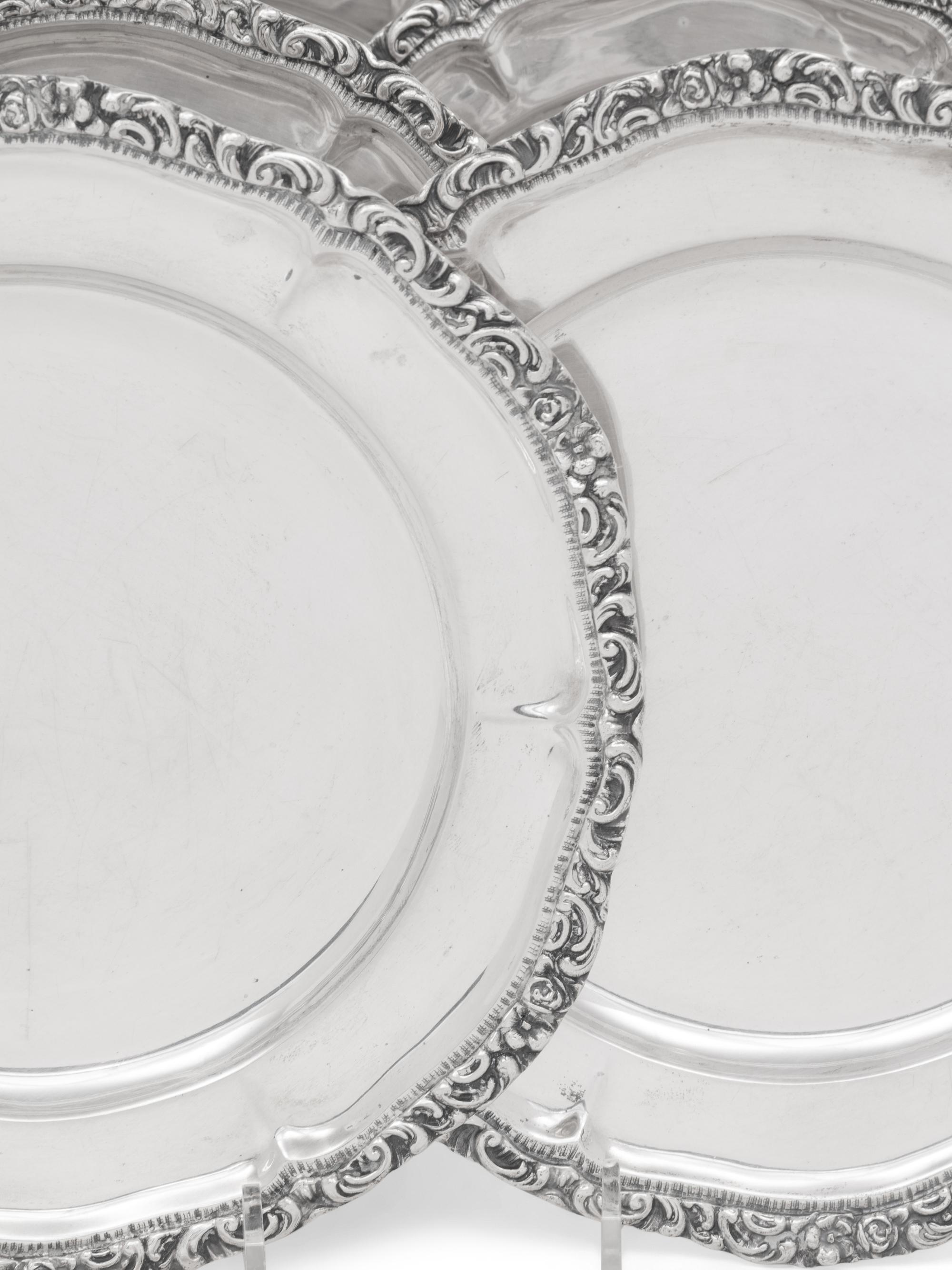 A Set of Twelve Continental Silver Dessert Plates
