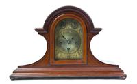 A Continental Mahogany Oversized Mantel Clock, Height 17 1/4 x width 27 1/2 inches.
