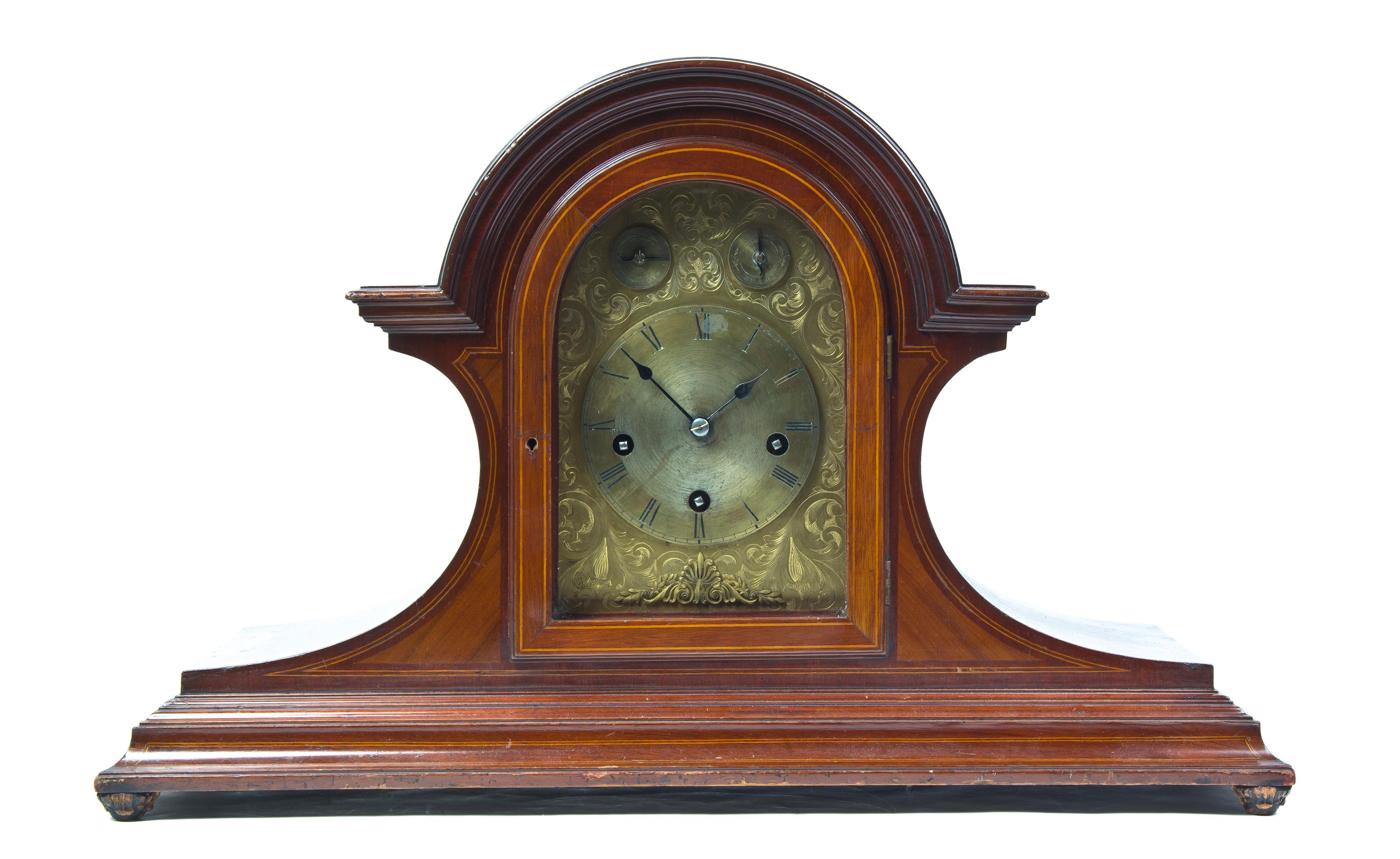 A Continental Mahogany Oversized Mantel Clock, Height 17 1/4 x width 27 1/2 inches.