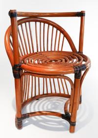 An Art Deco Style Rattan Chair Height 27 1/4 inches.