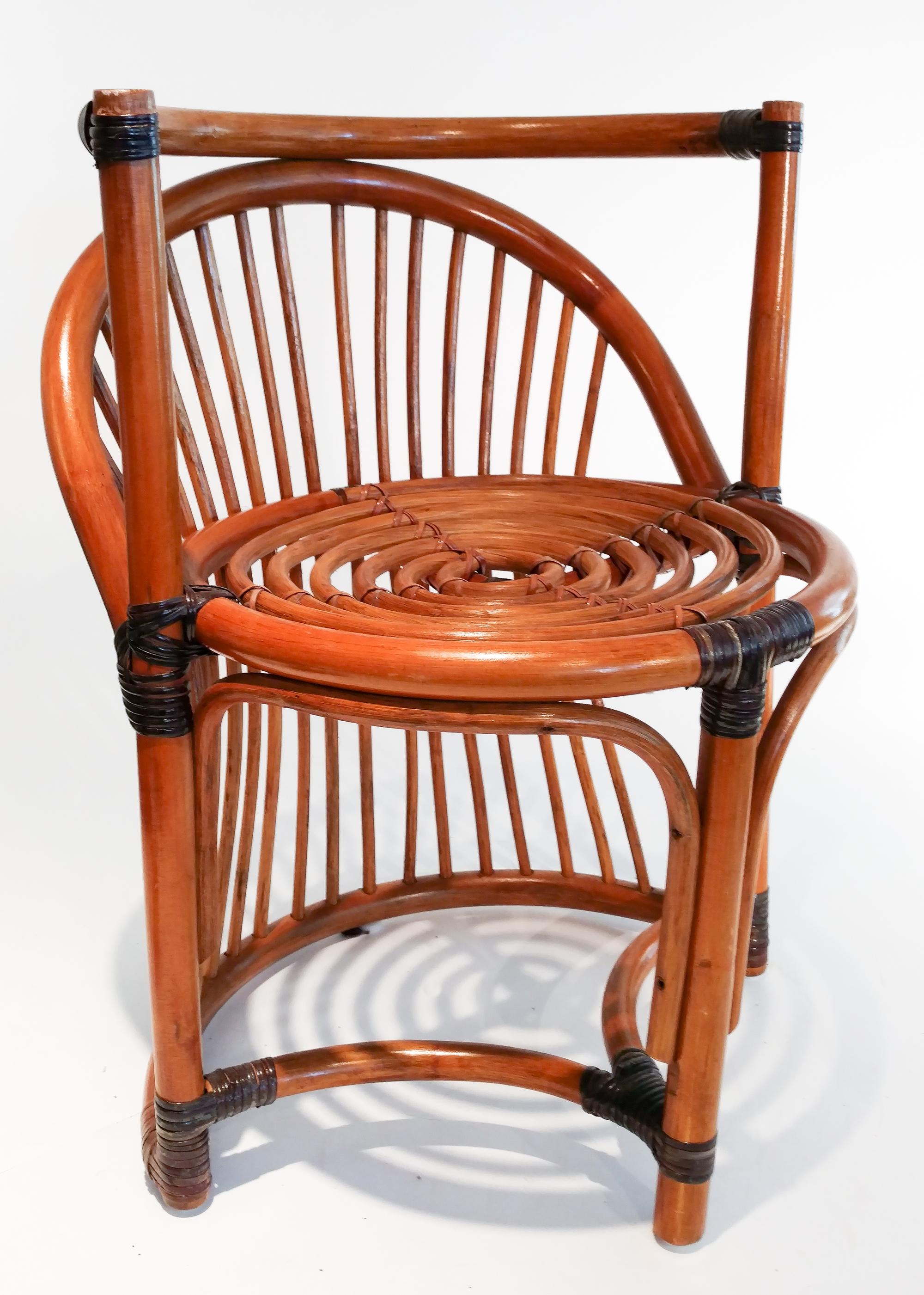 An Art Deco Style Rattan Chair Height 27 1/4 inches.