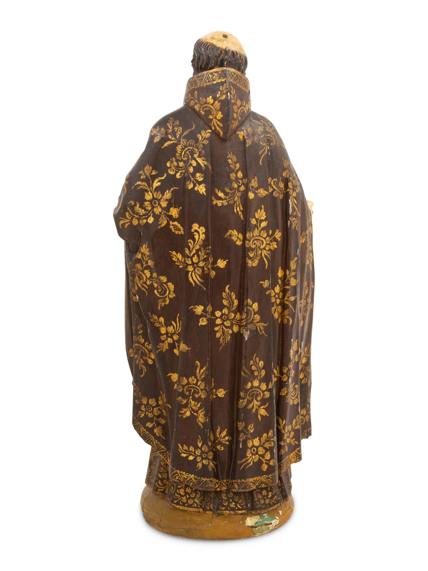 A Spanish Colonial Carved and Polychromed Figure of St. Anthony