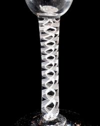 A Beilby Enameled Opaque Twist Wine Glass