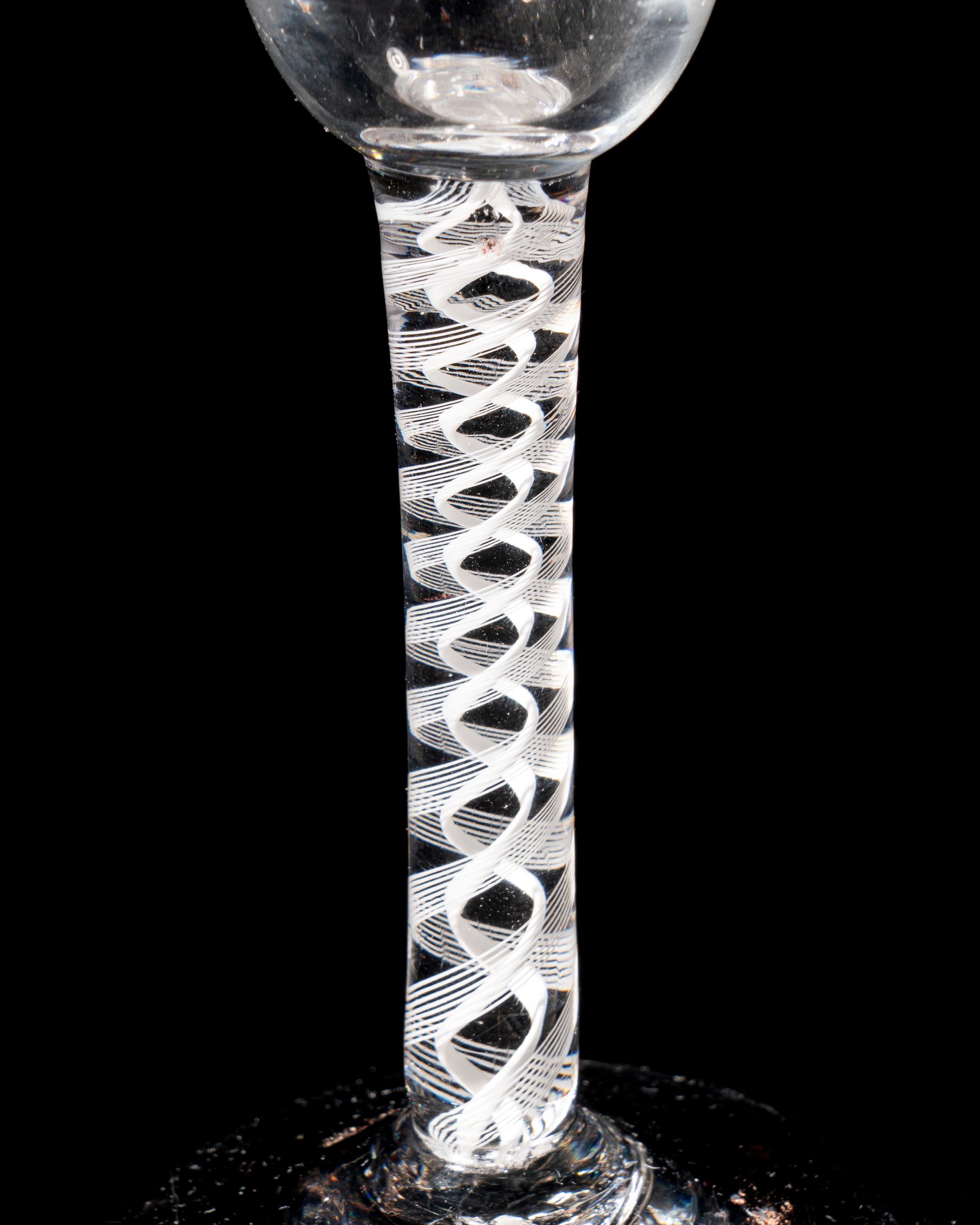 A Beilby Enameled Opaque Twist Wine Glass