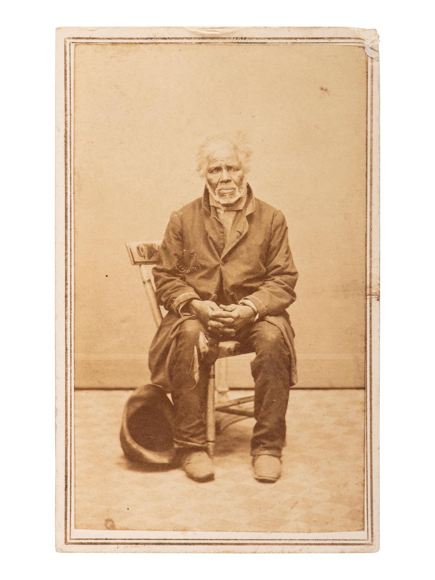 [EARLY PHOTOGRAPHY]. CDV of James Powell in tattered clothing. Carlisle, PA: J. McMillen, n.d.