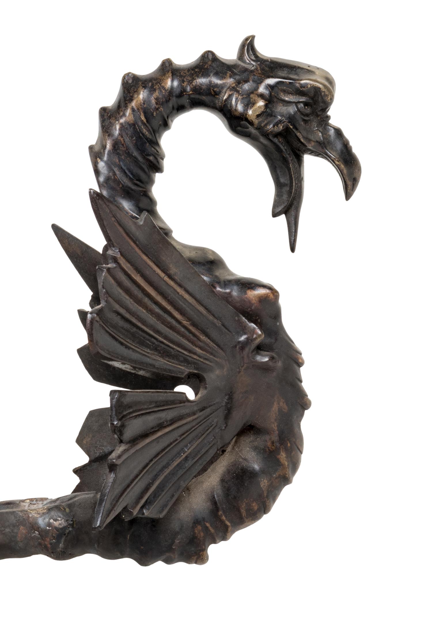 A Patinated Bronze Eight-Light 'Dragon' Chandelier