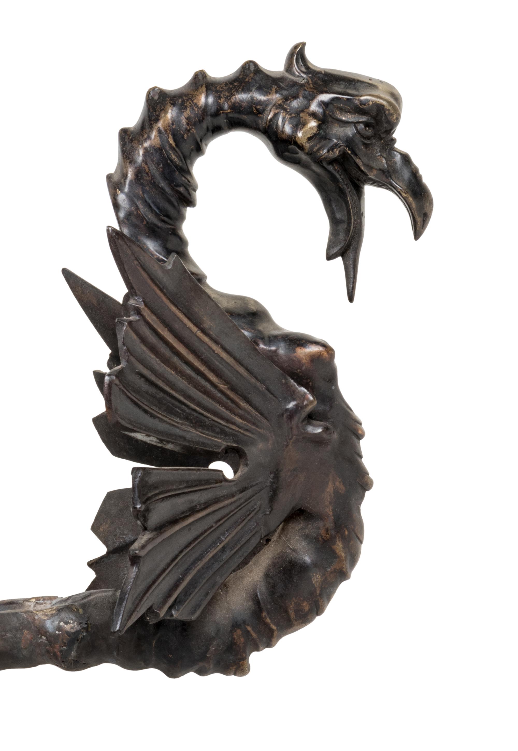 A Patinated Bronze Eight-Light 'Dragon' Chandelier