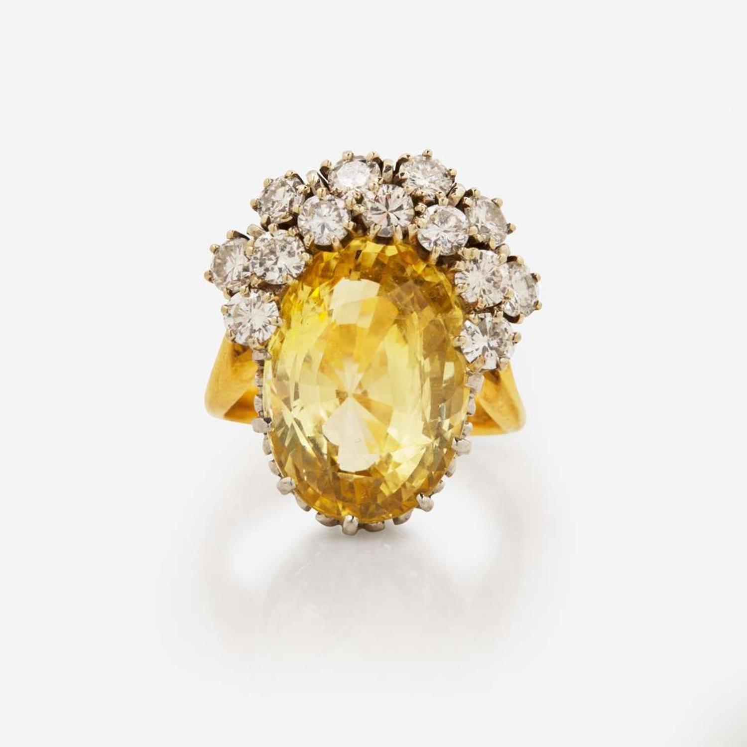 An 18K Yellow Gold, Platinum, Diamond, and Yellow Sapphire Ring