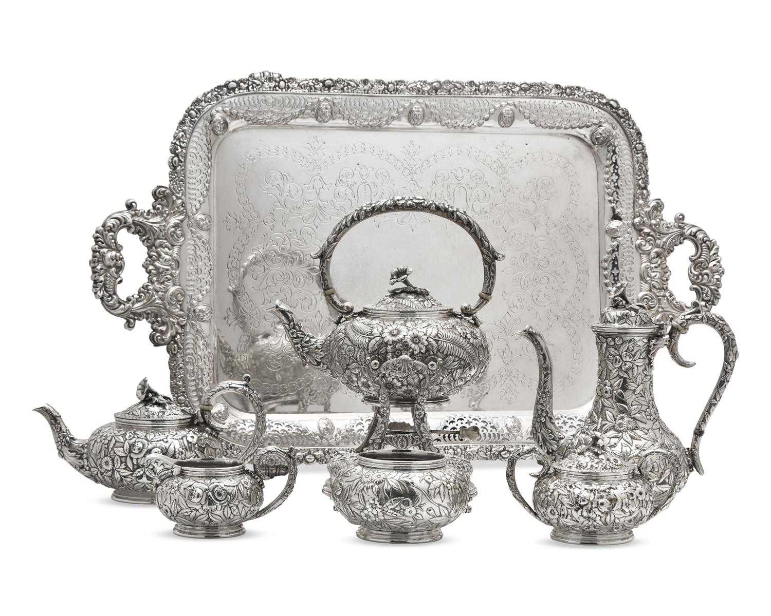 A Six-Piece Sterling Silver Floral Repousse Tea and Coffee Service