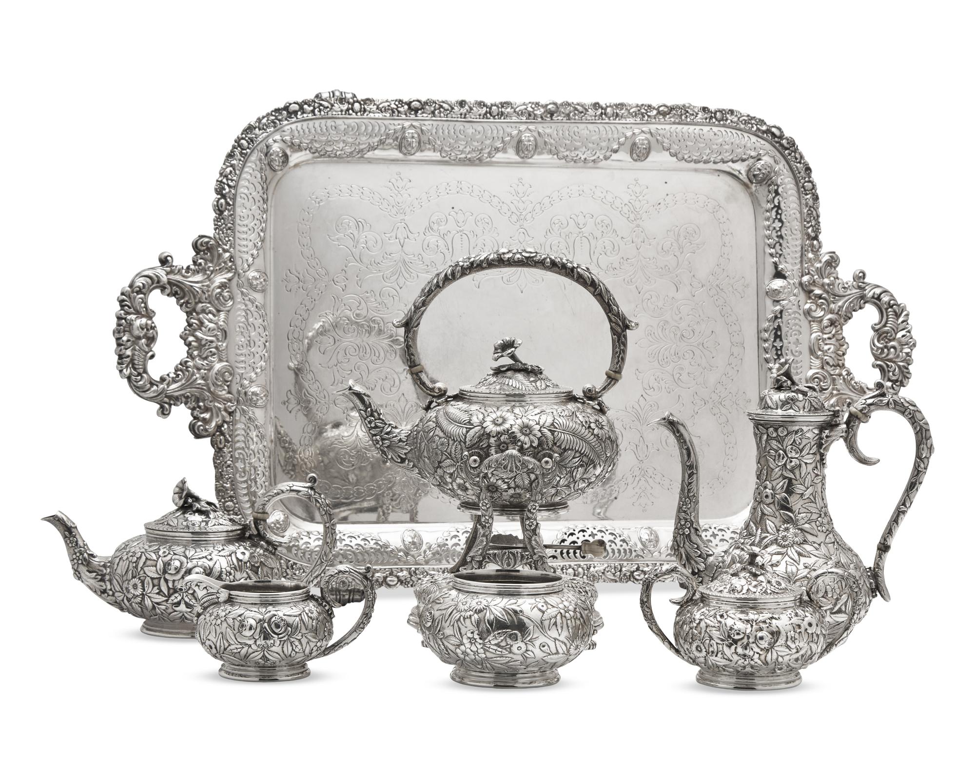 A Six-Piece Sterling Silver Floral Repousse Tea and Coffee Service