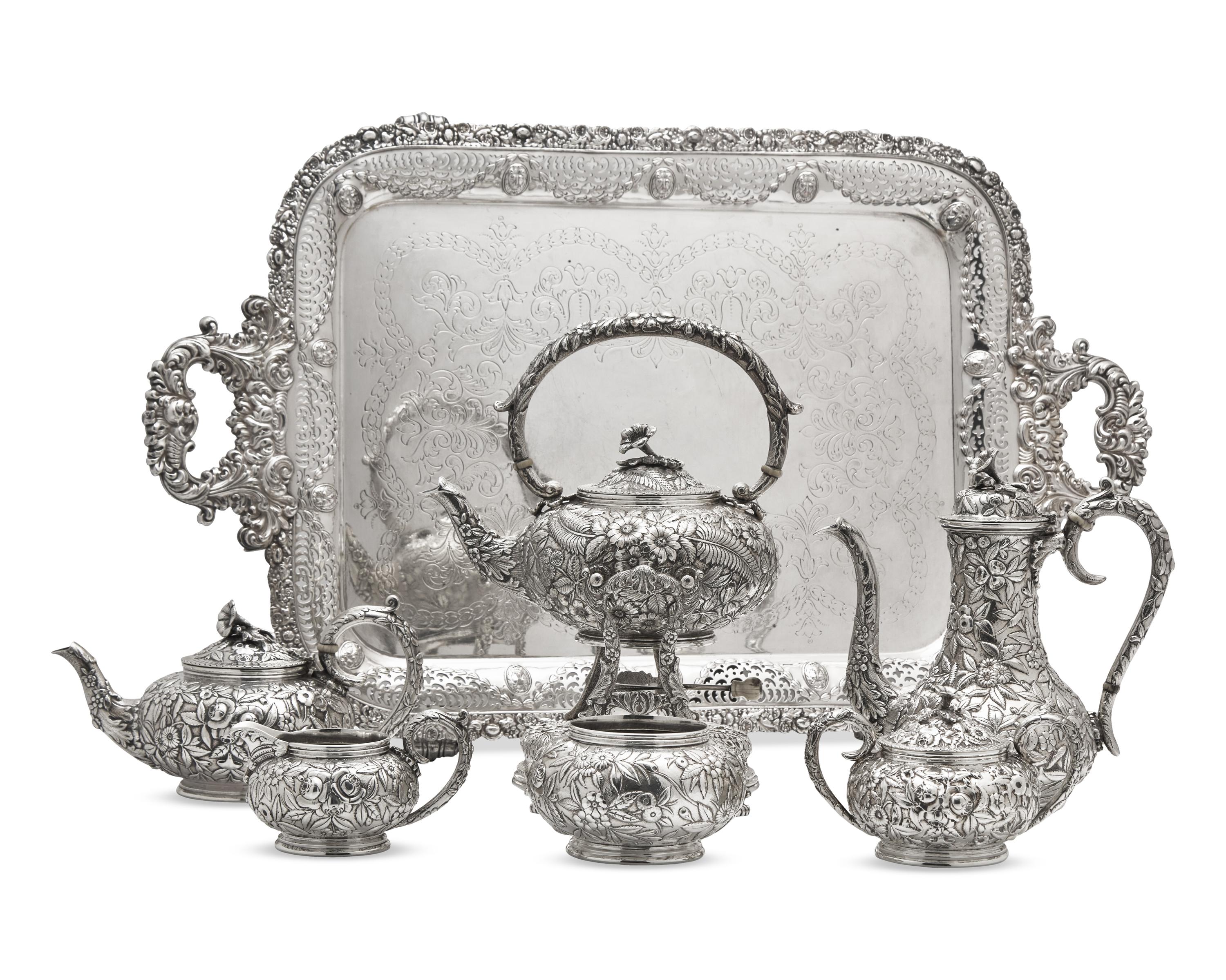 A Six-Piece Sterling Silver Floral Repousse Tea and Coffee Service