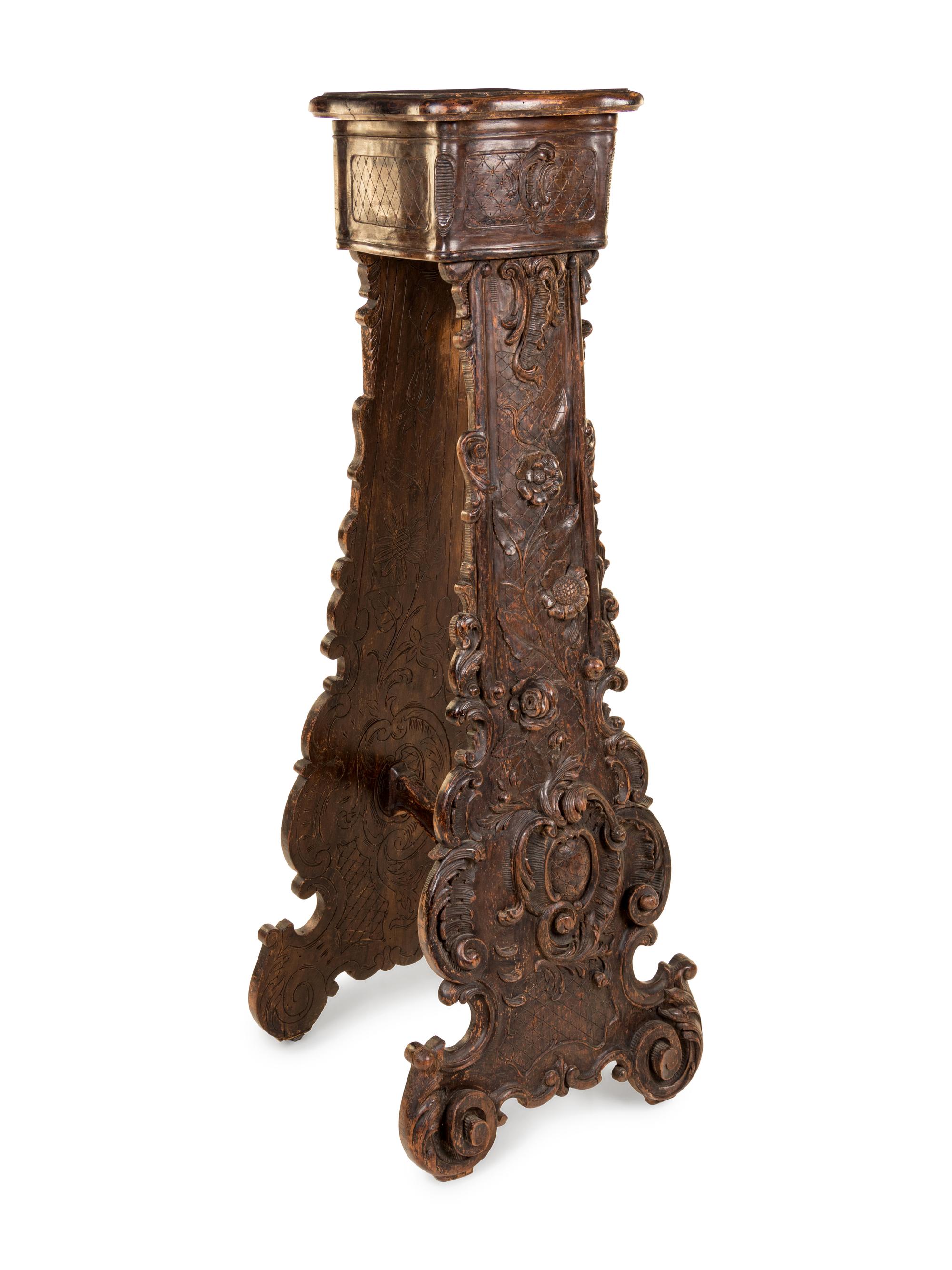An Italian Baroque Style Carved Walnut Pedestal