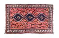 A Heriz Wool Rug 9 feet 6 inches x 6 feet 6 inches.