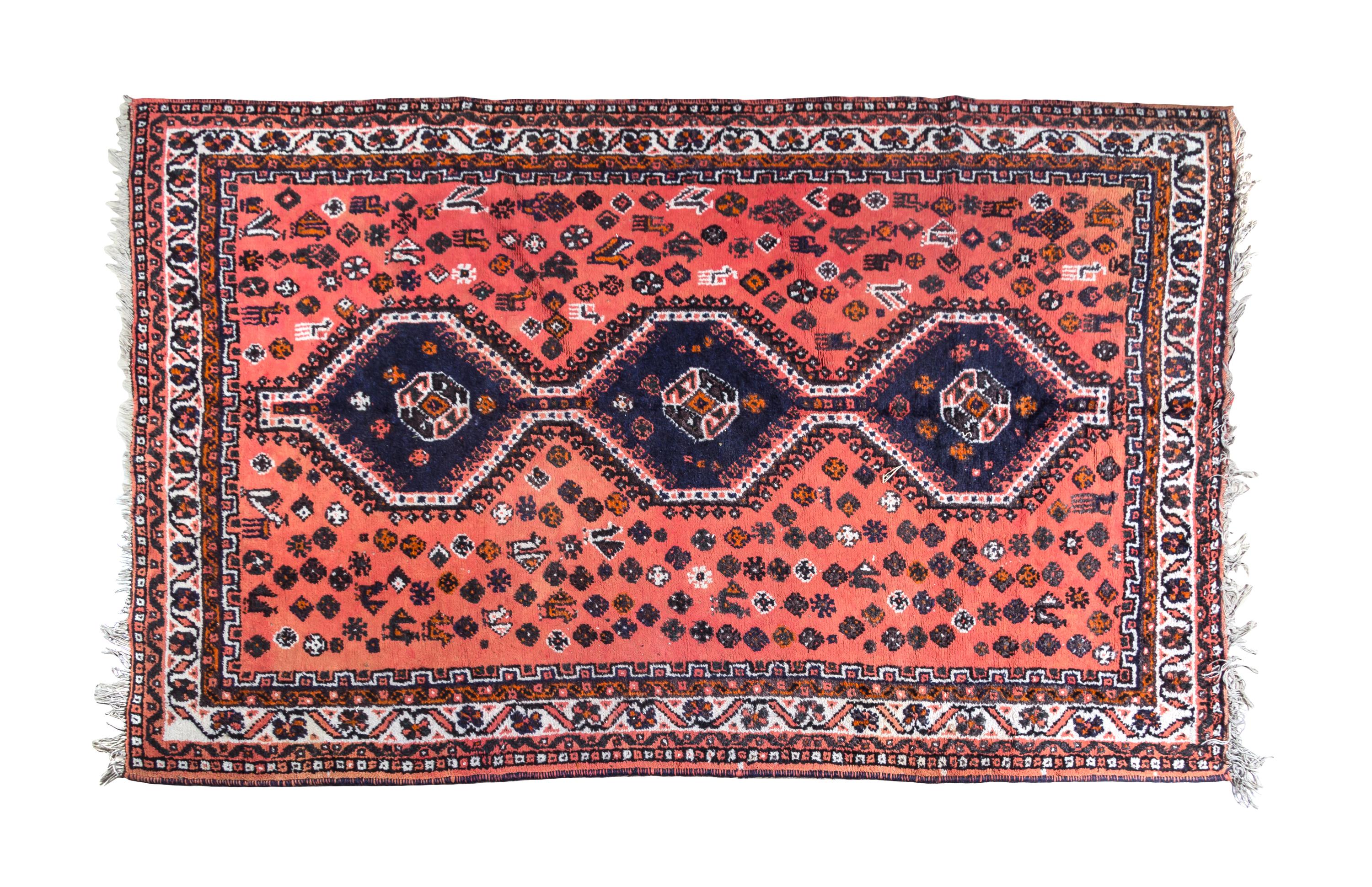 A Heriz Wool Rug 9 feet 6 inches x 6 feet 6 inches.