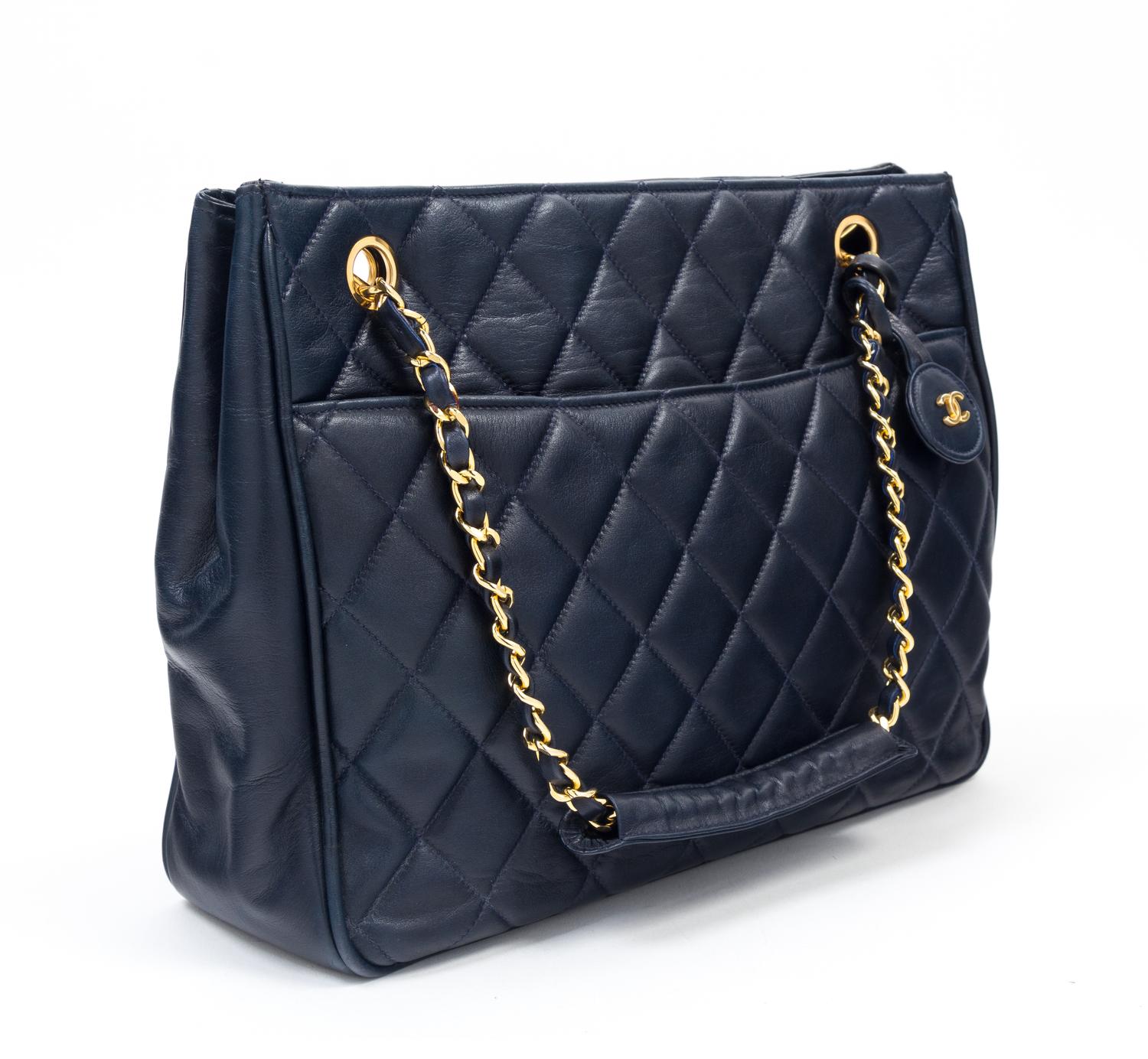 A Chanel Navy Quilted Leather Tote Handbag, 12" x 8" x 2"; Strap drop: 7".