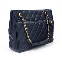 A Chanel Navy Quilted Leather Tote Handbag, 12" x 8" x 2"; Strap drop: 7".