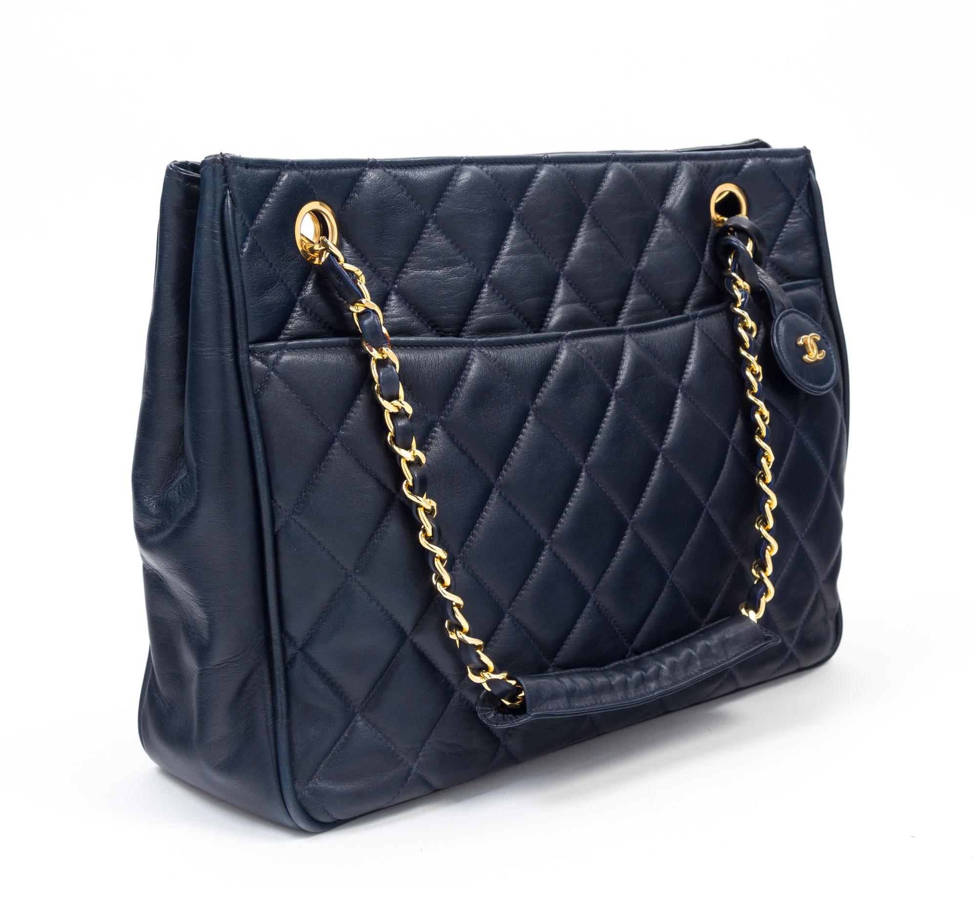 A Chanel Navy Quilted Leather Tote Handbag, 12" x 8" x 2"; Strap drop: 7".