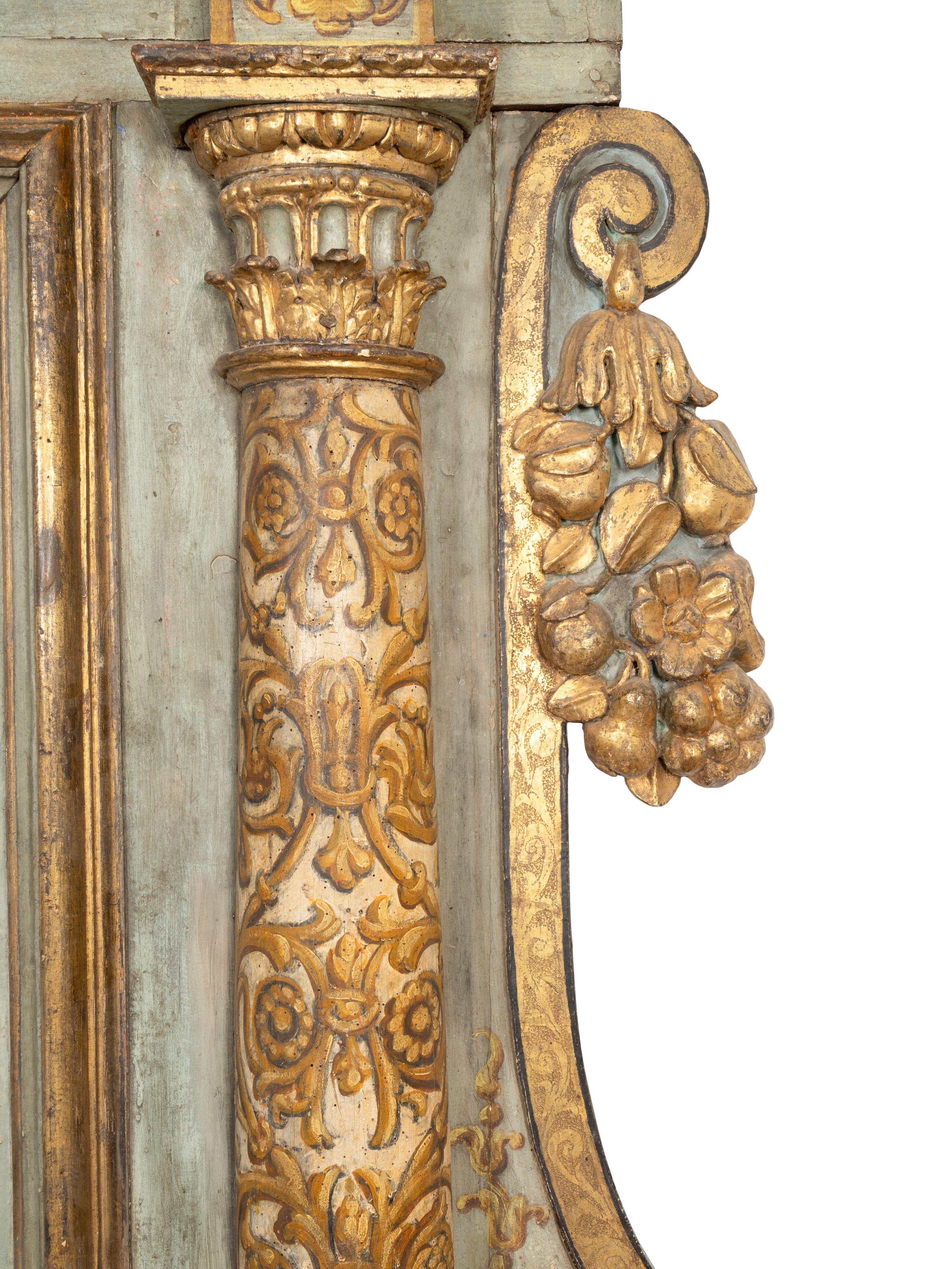 An Italian Baroque Painted and Parcel Gilt Portal