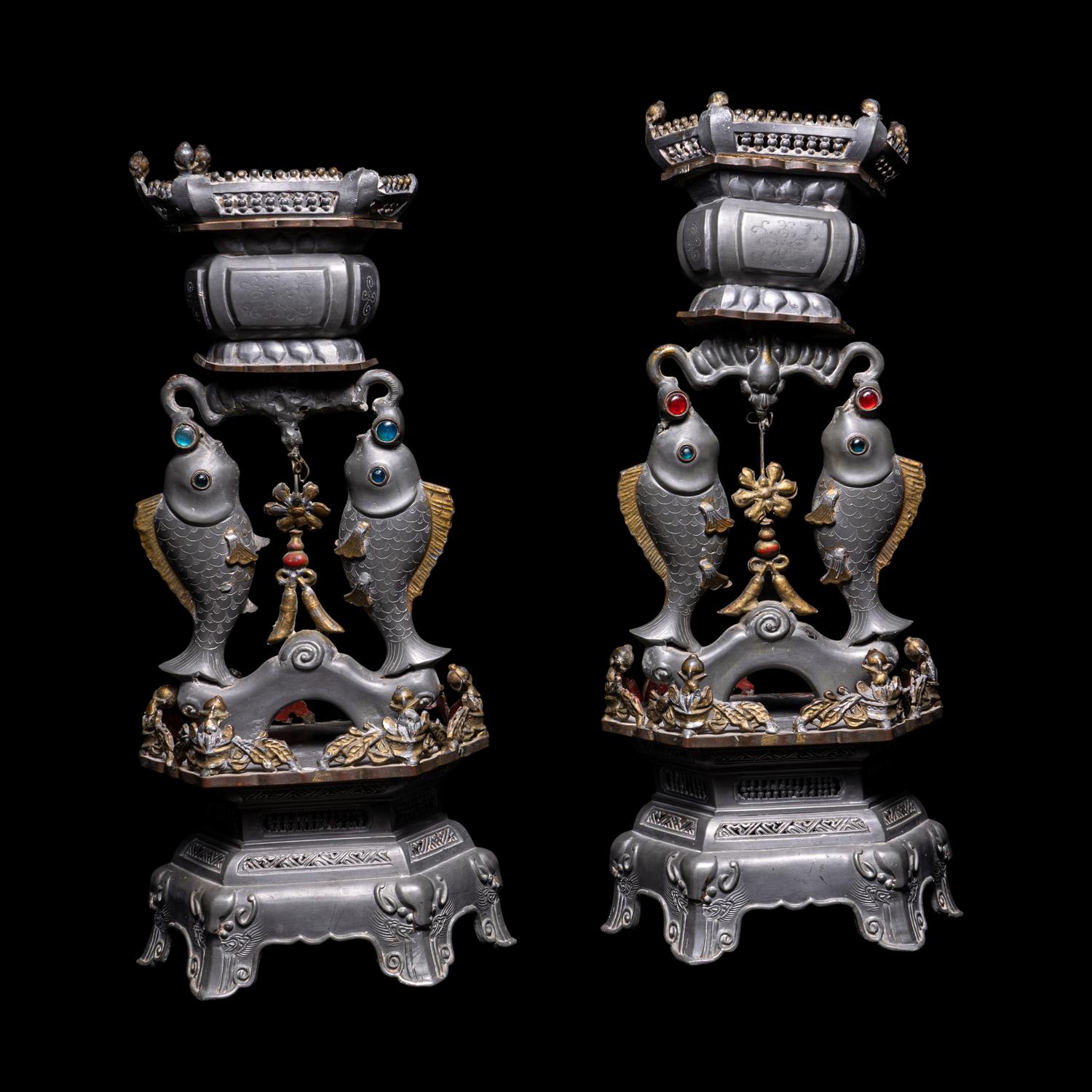 A Pair of Chinese Glass Inset Pewter 'Abundance' Candle Holders