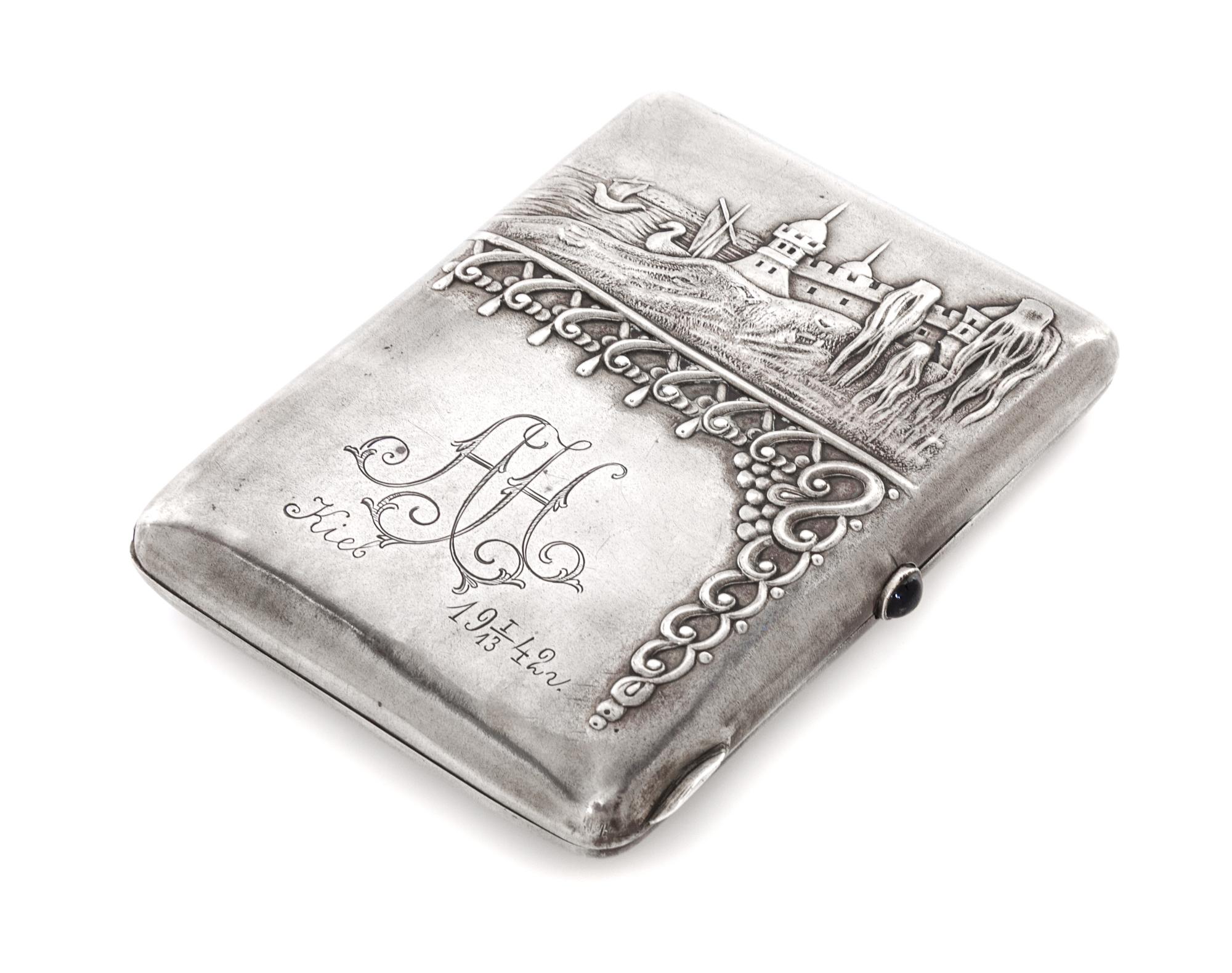 A Russian Silver Cigarette Case, Marker's mark Cyrilic GYe, Moscow, early 20th century, the lid with a raised depiction of a coastal fo