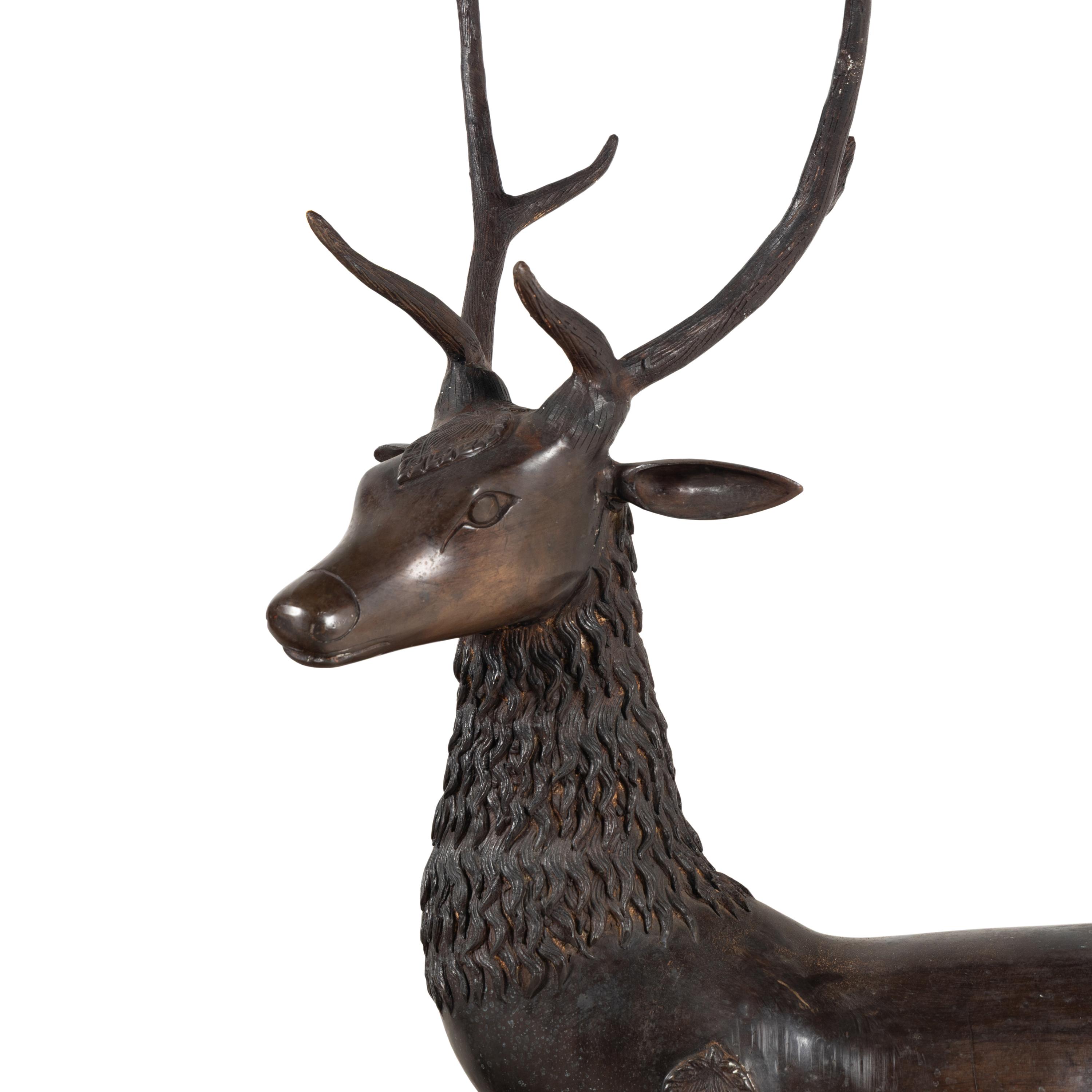 A Pair of Bronze Models of Stags