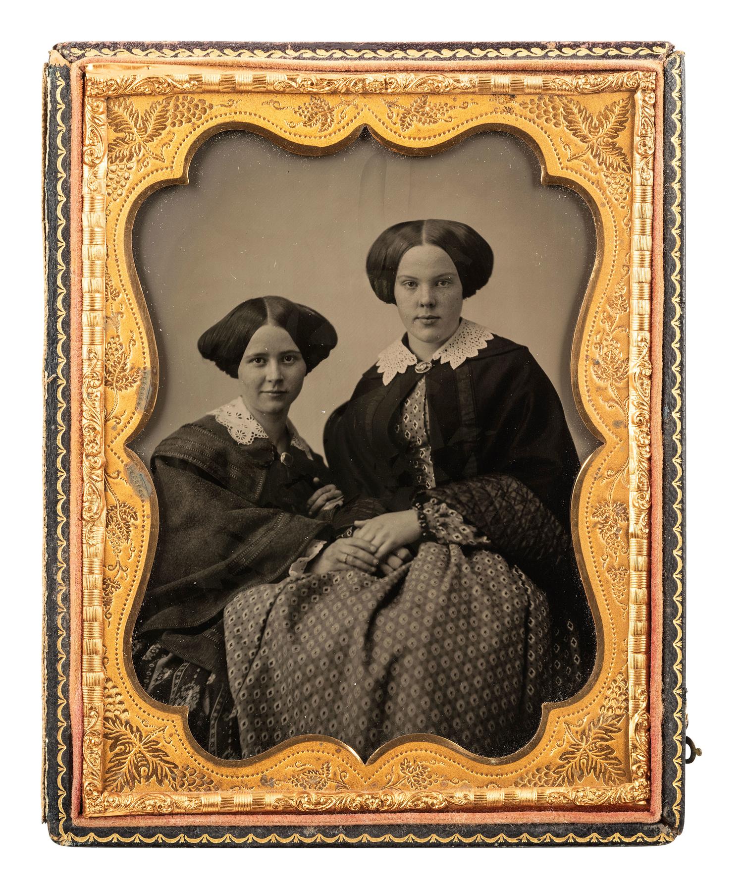 [EARLY PHOTOGRAPHY]. Half plate ambrotype of attractive young women, possibly sisters.
