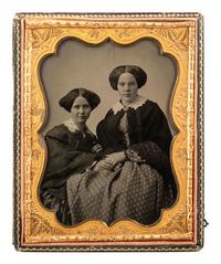 [EARLY PHOTOGRAPHY]. Half plate ambrotype of attractive young women, possibly sisters.