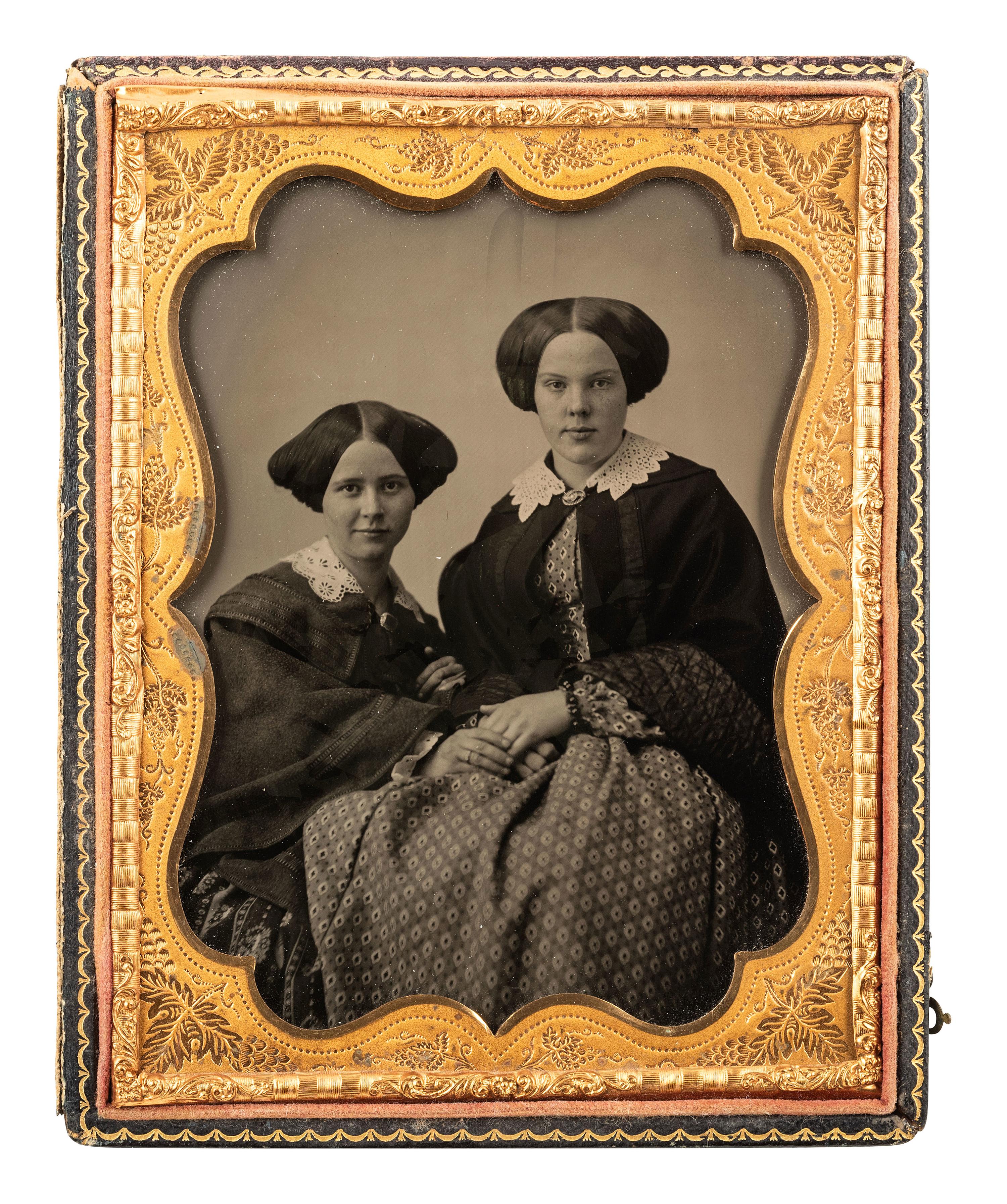[EARLY PHOTOGRAPHY]. Half plate ambrotype of attractive young women, possibly sisters.