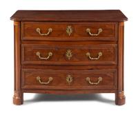 A Régence Gilt Metal Mounted Carved Walnut Serpentine Commode