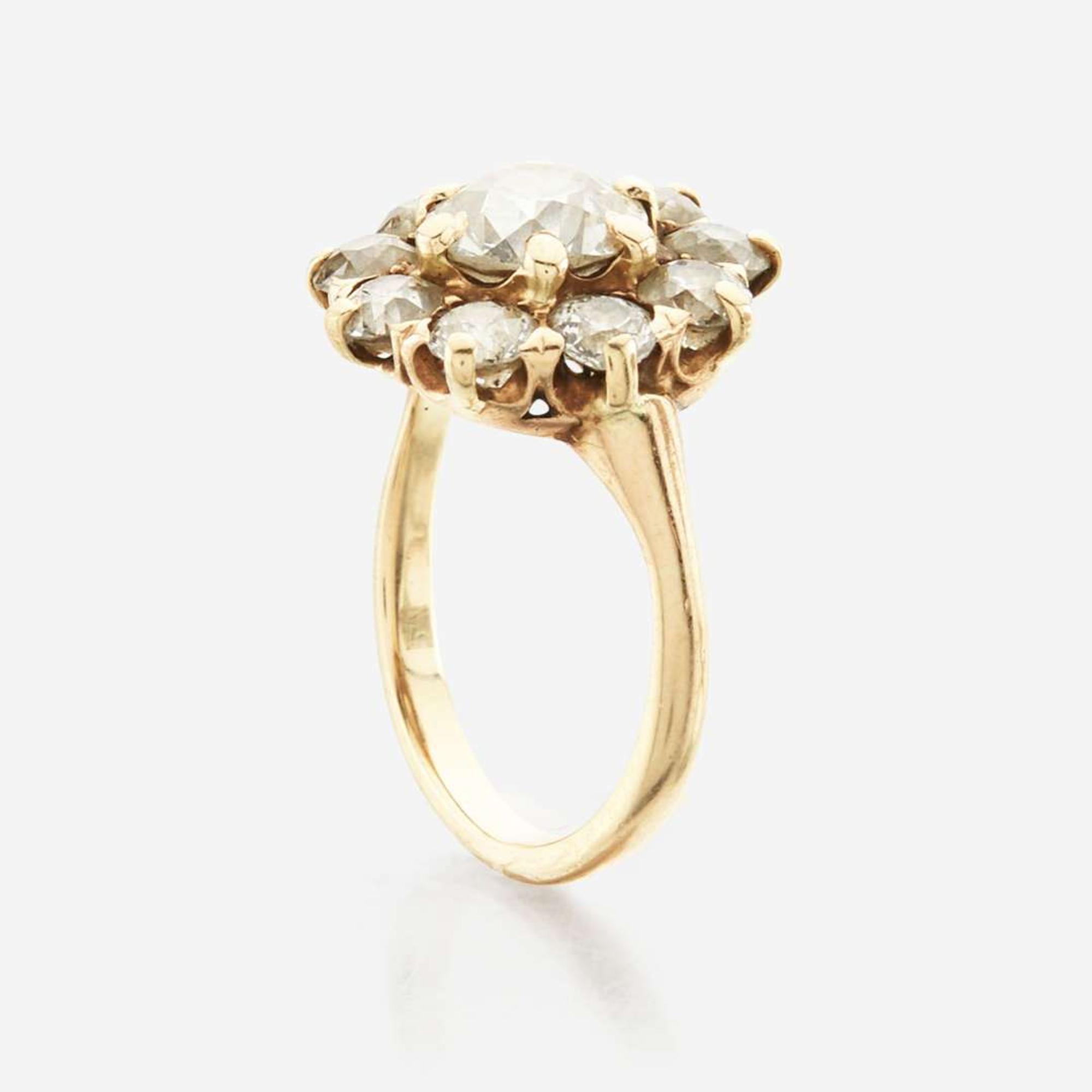 A diamond and gold ring