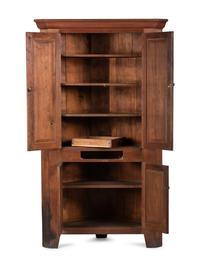 A Late Federal Walnut Corner Cupboard