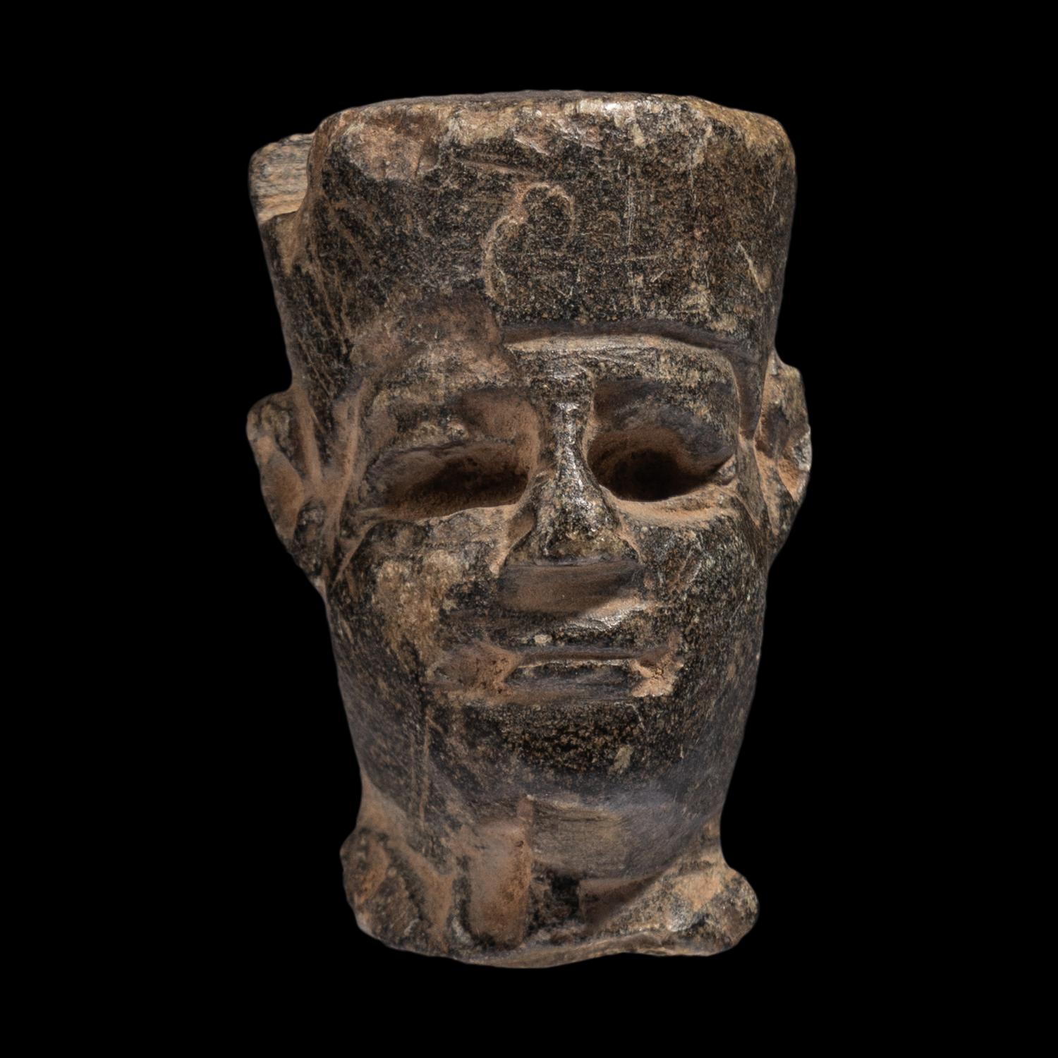 An Egyptian Stone Head of Amun