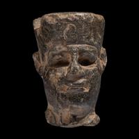An Egyptian Stone Head of Amun