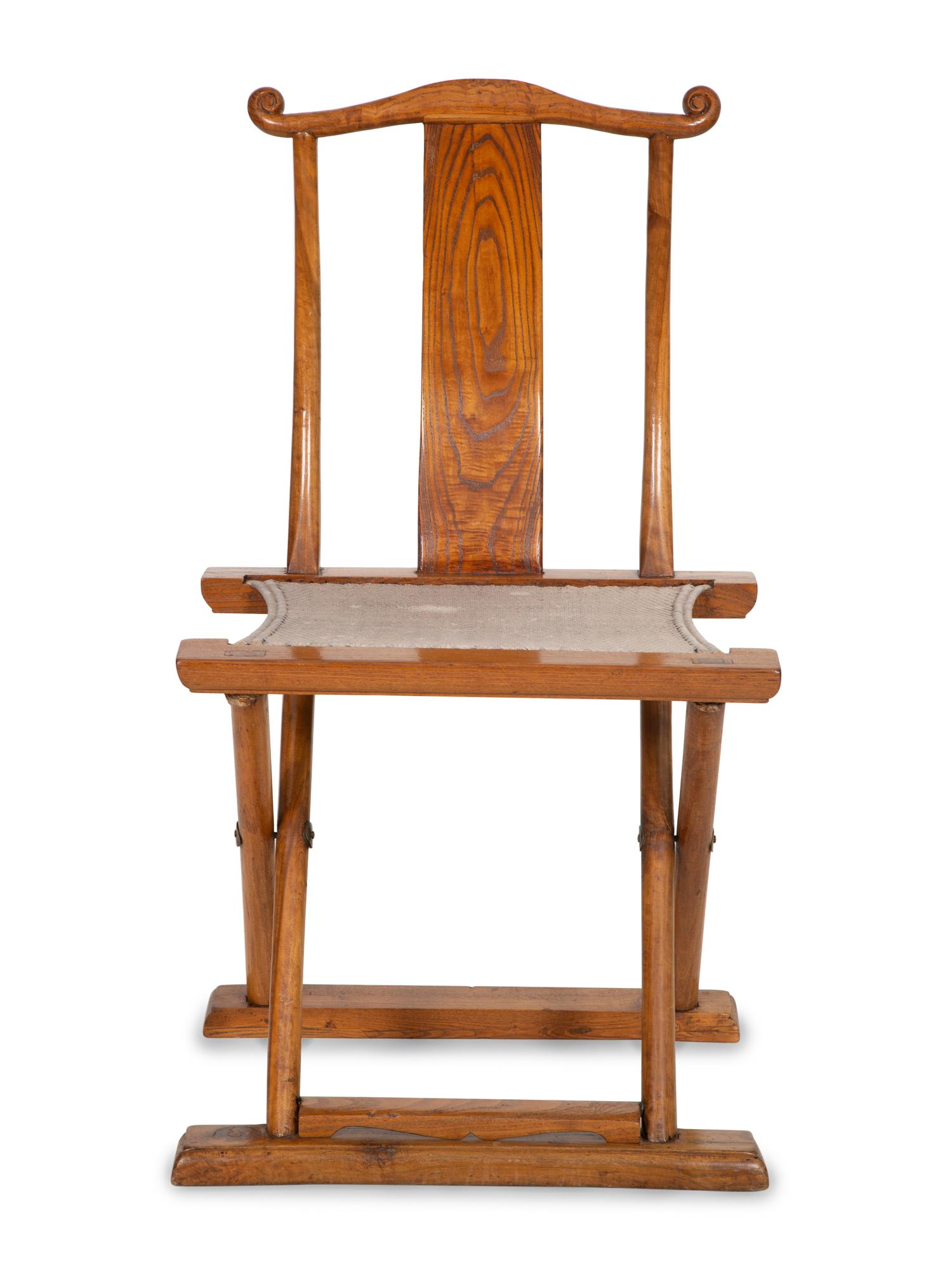 A Chinese Hardwood Campaign Chair