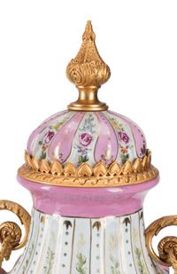 A Pair of Gilt Bronze Mounted Sèvres Style Porcelain Urns