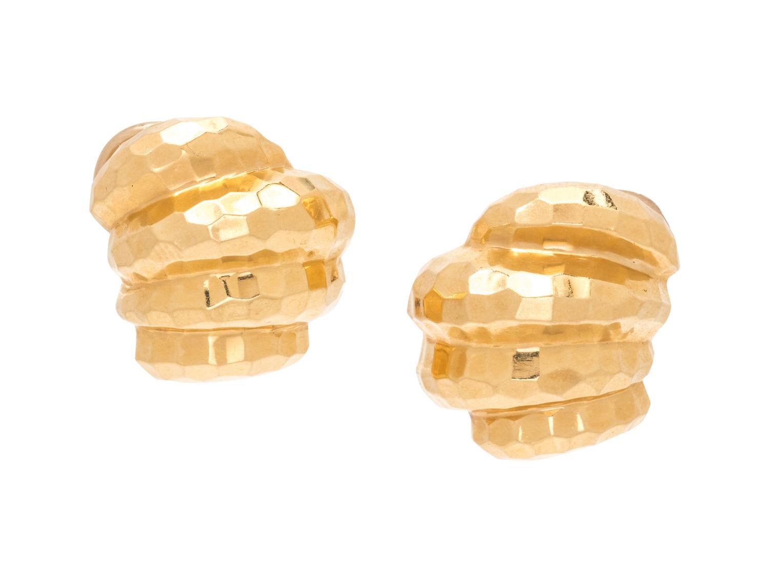 A Pair of 14 Karat Yellow Gold Earclips,