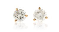 A Pair of 14 Karat Yellow Gold and Diamond Stud Earrings, 1.10 dwts.