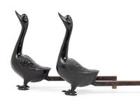 A Pair of Cast Metal Goose-Form Andirons
