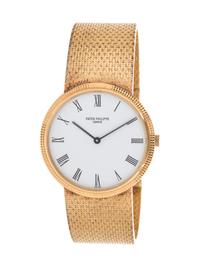 PATEK PHILIPPE, 18K YELLOW GOLD REF. 3954 'CALATRAVA' WRISTWATCH