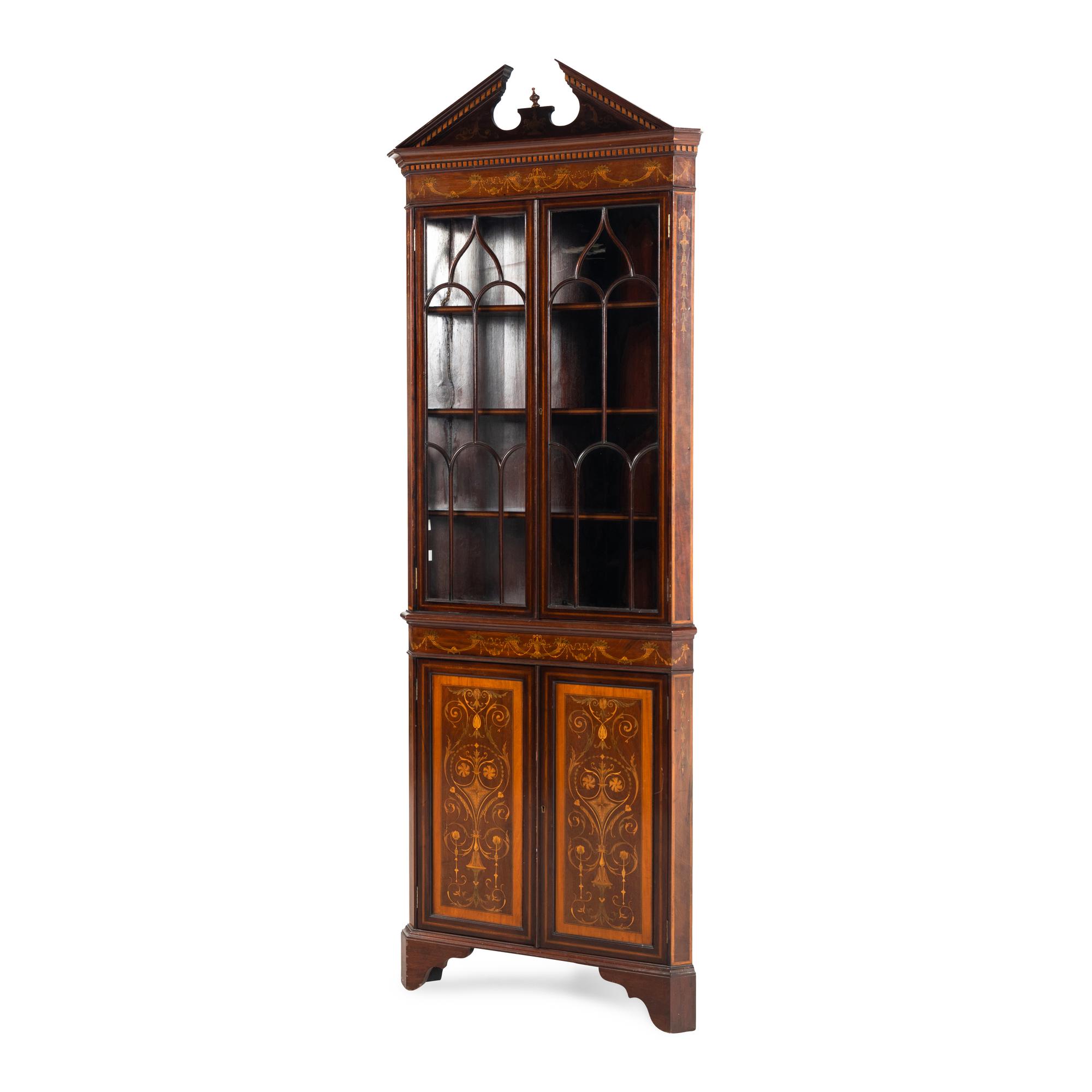 An Edwardian Fruitwood- Inlaid Mahogany Corner Cupboard