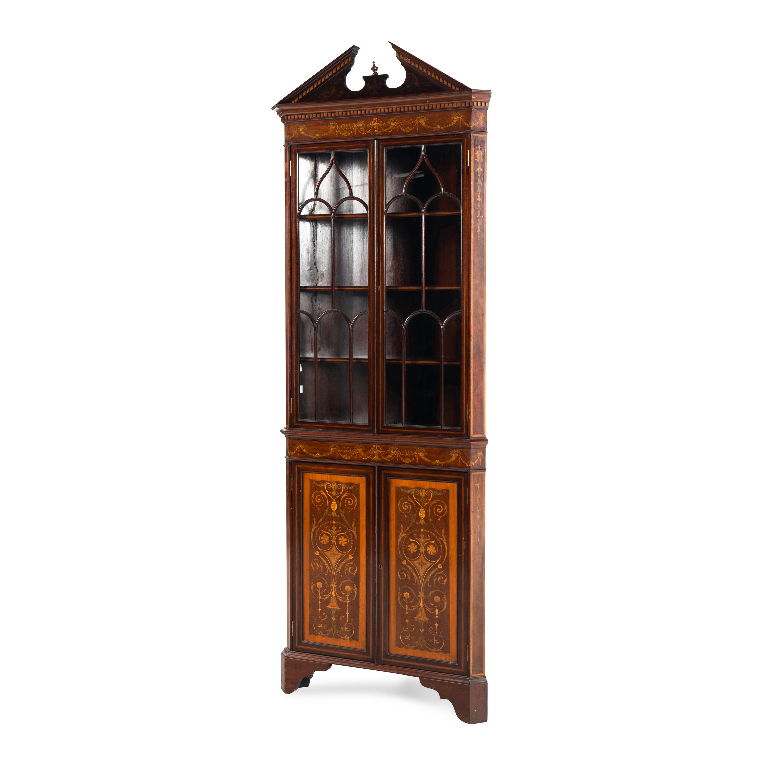 An Edwardian Fruitwood- Inlaid Mahogany Corner Cupboard